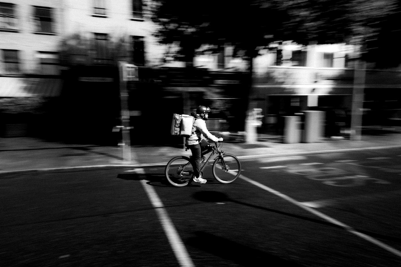 A rider moving through a city street